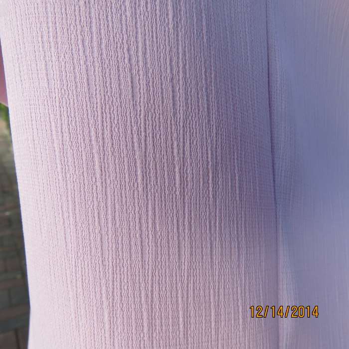 Boutique made lavender short sleeve top-jacket. Vertical textured polyester, Size 37