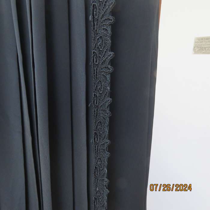 Very black silky,shiny knife pleated fold over ankle lenght skirt. Size 34/36 by TRUWORTHS. New cond