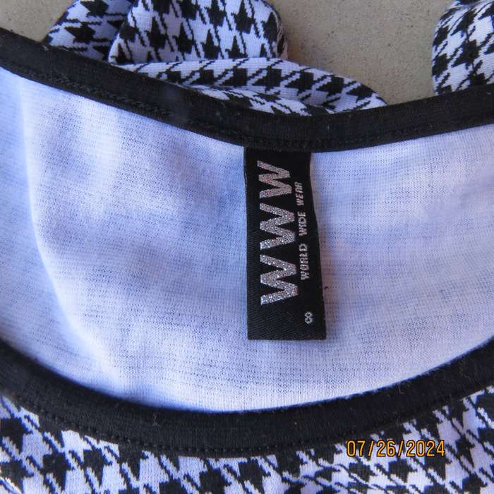 WWW peplum style houndstooth  long sleeve top-blacl inlays..Size 30