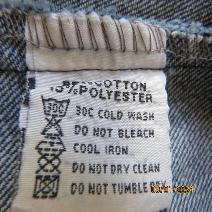 Button down blue jean knee length skirt in polycotton denim. Size 36. Front pockets. As new
