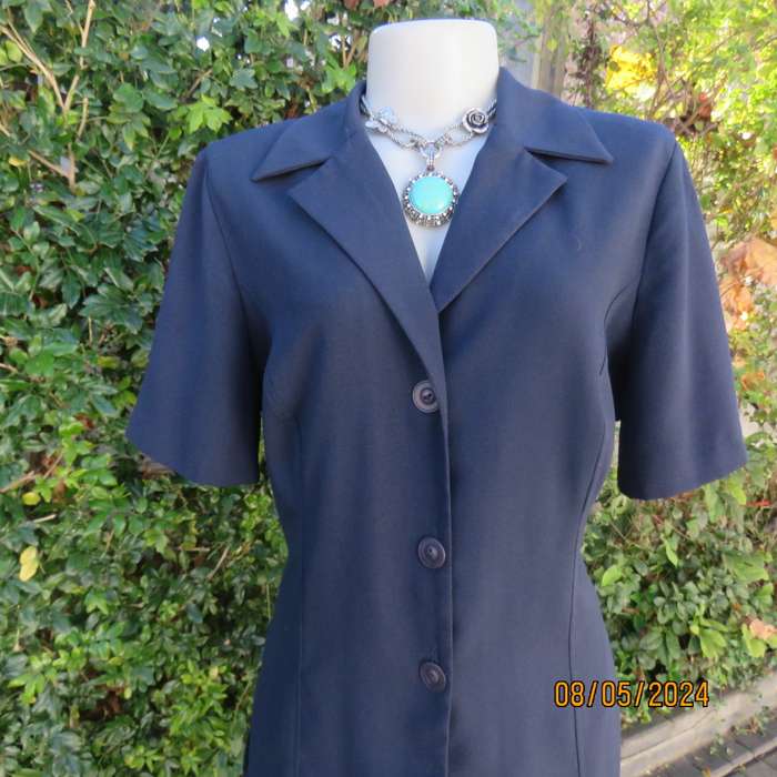 TOPICS navy button down princess cut short sleeve jacket with collar.Size 38 .