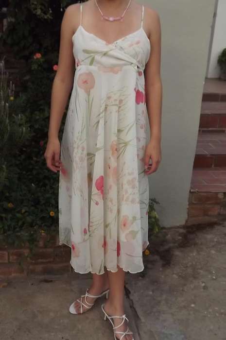 Floral Chiffon Fully Lined Dress with Peculiar Bust design  in a size medium.