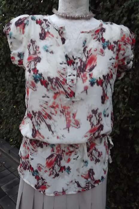Fashionable Long Top in patterned sheer fabric in size 10/34 - as new