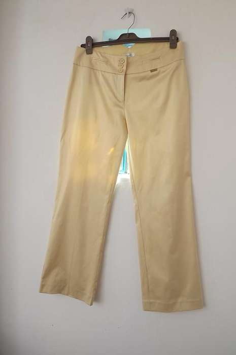 Beautiful shiny corn colour polycotton stretch pants by Oasis size 36/12.Dummy pockets front & back