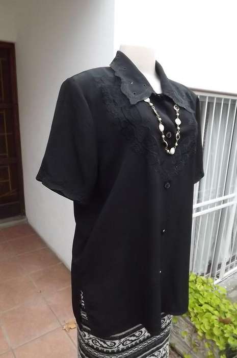 Elegant black blouse with beautiful embroidery and cut-out work.Size 42/18 by Rachel.Laced decoratio