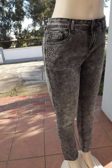 Denim jeans with grey bleached look by Fashion Express size 38/14.Medium rise.