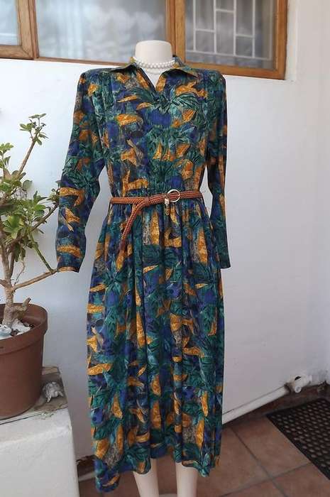 Turquoise,blue and mustard patterned 100% viscose dress size 34/10 by Truworths.Top button down