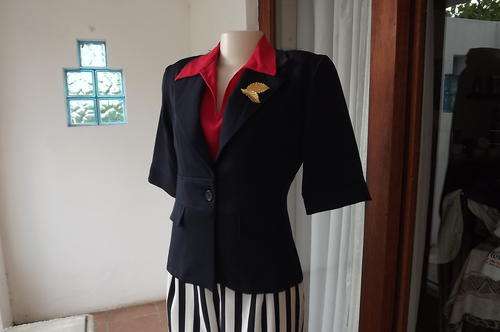 Smart navy short ladies jacket in tailored style by "Judy Joy" in size 34/10.Waistband on front