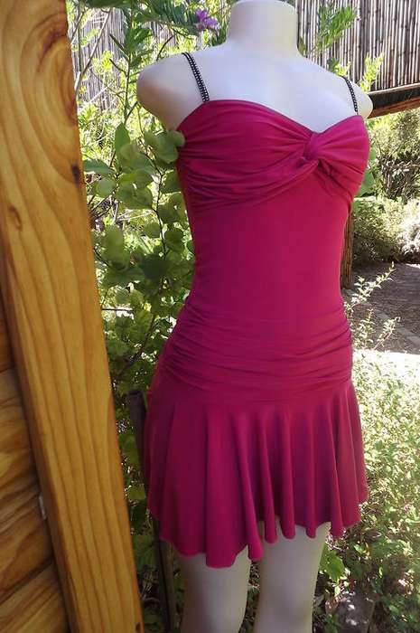 Sexy pink strappy dress in stretch polyester. Size 32/8 by Paocthip. Short flare skirt. As new.