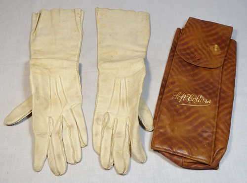 Vintage genuine leather woman`s gloves in bag