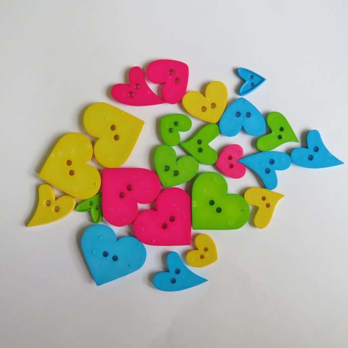 Lot of 21 different colour heart shape buttons