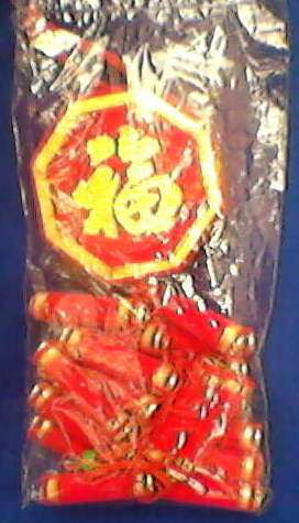 CHINESE HANGING. STILL SEALED