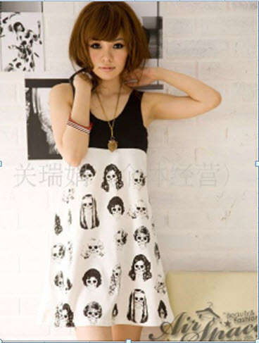 Black & white cotton blouse, upper is black and lower is white with faces printed