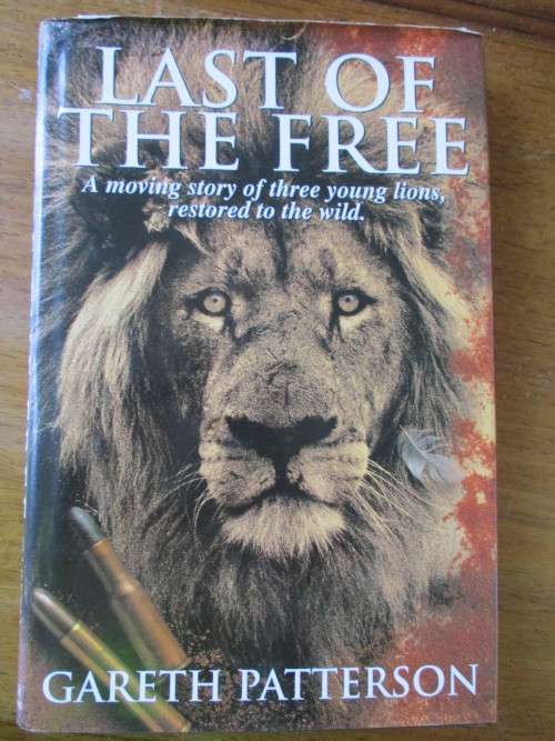 Gareth Patterson. LAST OF THE FREE. Three young lions restored to the wild