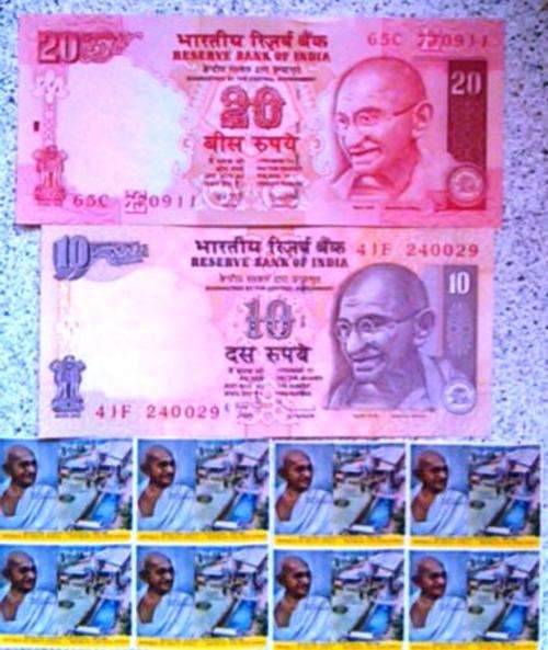 2 X GANDHI UNC NOTES PLUS 8 X MNH STAMPS