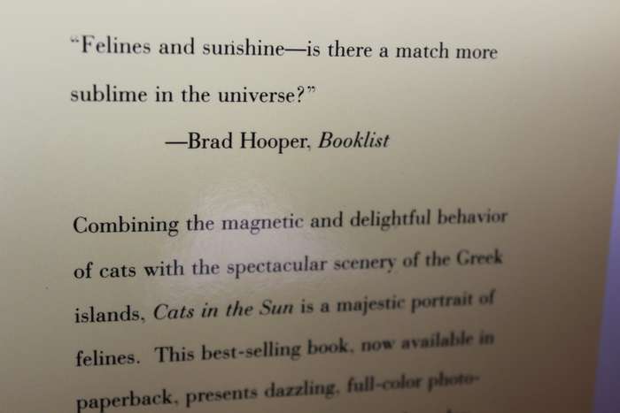 CATS IN THE SUN. Hans Silvester. (Combining cats with scenery of the Greek Islands)