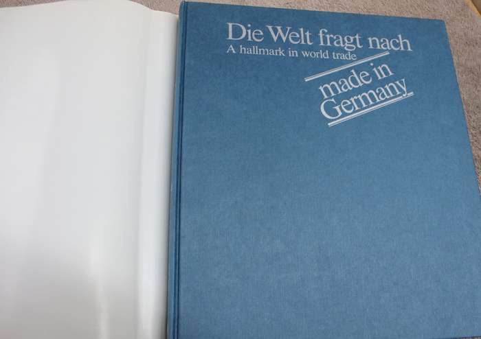 DIE WELT FRAGT NACH. A hallmark in world trade. Made in Germany. Alfred Lau.  (W)