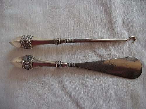 Lovely baluster shaped Sterling silver handled button hook & shoe stretcher set