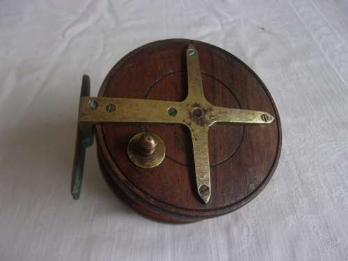 Vintage wood and brass centrepin fishing reel