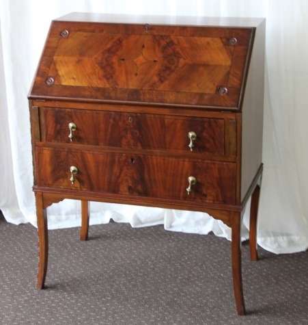 A MAGNIFICENT ANTIQUE FLIP-TOP WRITING DESK WITH TWO DRAWERS AND INLAY DETAILING