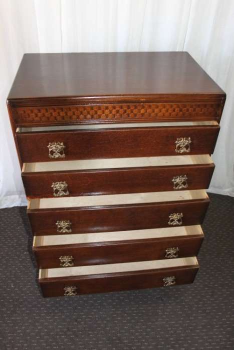 A beautiful Solidly built 5-drawer chest of drawers with stunning styling & ornate handles