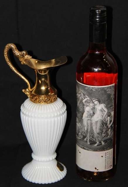 An extremely rare French ''opaline trianon'' milk glass jug with gold plated embellishments