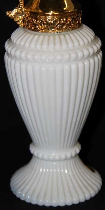 An extremely rare French ''opaline trianon'' milk glass jug with gold plated embellishments