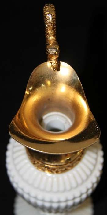 An extremely rare French ''opaline trianon'' milk glass jug with gold plated embellishments