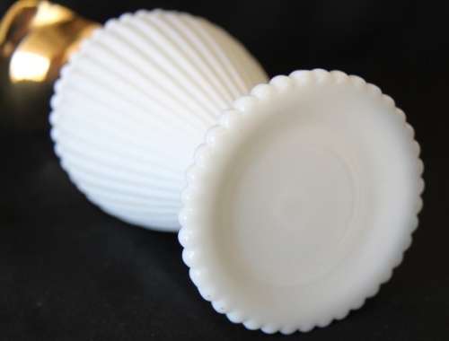 An extremely rare French ''opaline trianon'' milk glass jug with gold plated embellishments