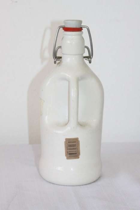 An awesome vintage German "Rauchenfelser Steinbier" porcelain Xmas commemorative flip-top decanter