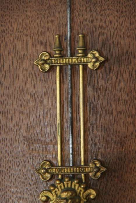 A spectacular antique (c.1890) German regulatory pendulum wall clock with a porcelain clock face