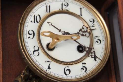 A spectacular antique (c.1890) German regulatory pendulum wall clock with a porcelain clock face
