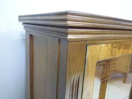 An exquisite vintage Teak 'Adam Bede' bookcase/showcase with a double door bottom cabinet.Stunning!!