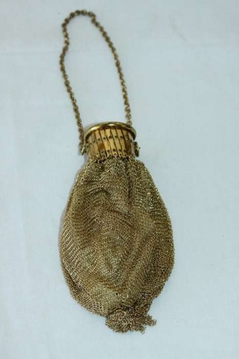 A beautiful vintage Art Deco "gold" wire mesh ladies formal evening bag with diamante in the lid