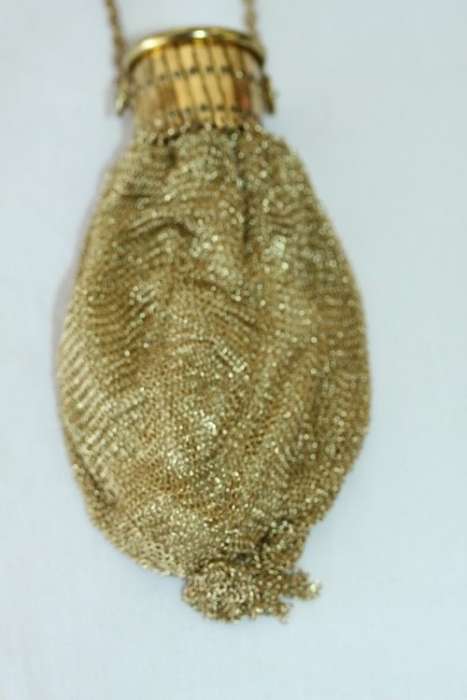 A beautiful vintage Art Deco "gold" wire mesh ladies formal evening bag with diamante in the lid