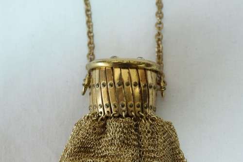 A beautiful vintage Art Deco "gold" wire mesh ladies formal evening bag with diamante in the lid