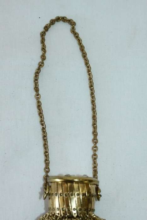 A beautiful vintage Art Deco "gold" wire mesh ladies formal evening bag with diamante in the lid