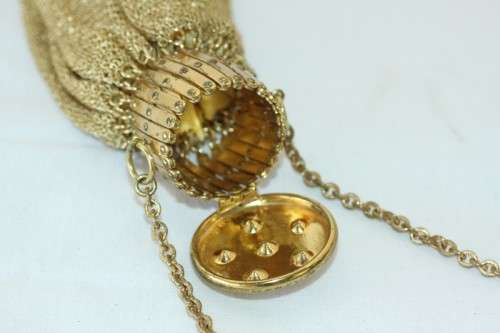 A beautiful vintage Art Deco "gold" wire mesh ladies formal evening bag with diamante in the lid