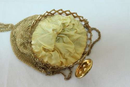 A beautiful vintage Art Deco "gold" wire mesh ladies formal evening bag with diamante in the lid