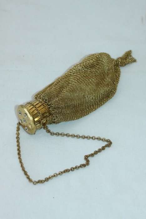A beautiful vintage Art Deco "gold" wire mesh ladies formal evening bag with diamante in the lid