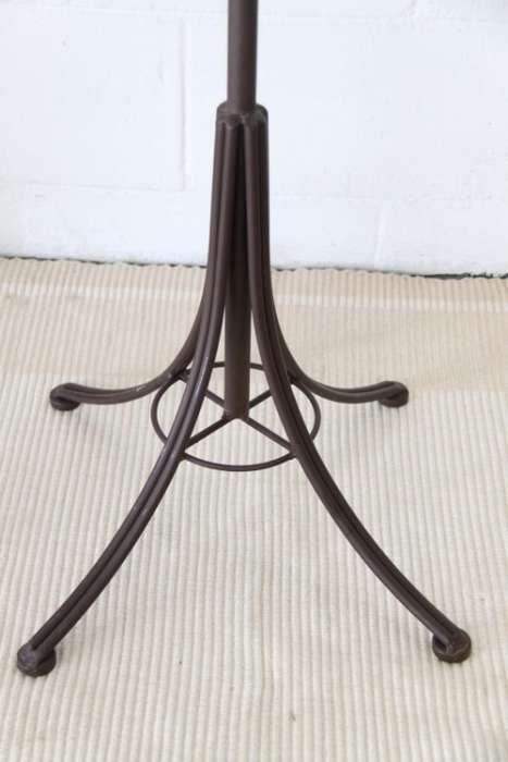 A stunning tall wrought iron coat rack/ hat stand with loads of space in very good condition