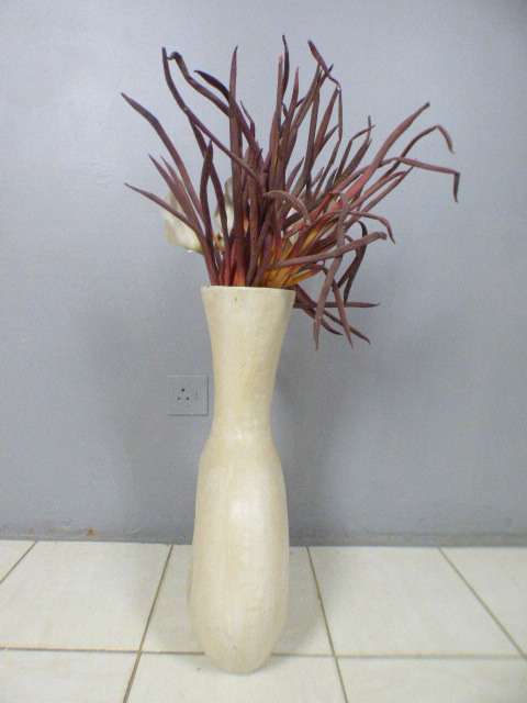 A beautiful HUGE floor standing ceramic vase. Gorgeous on its own or w/ large flower cuttings.