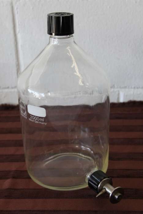 A vintage Duran 2000ml laboratory bottle made for maximum chemical and thermal shock resistance