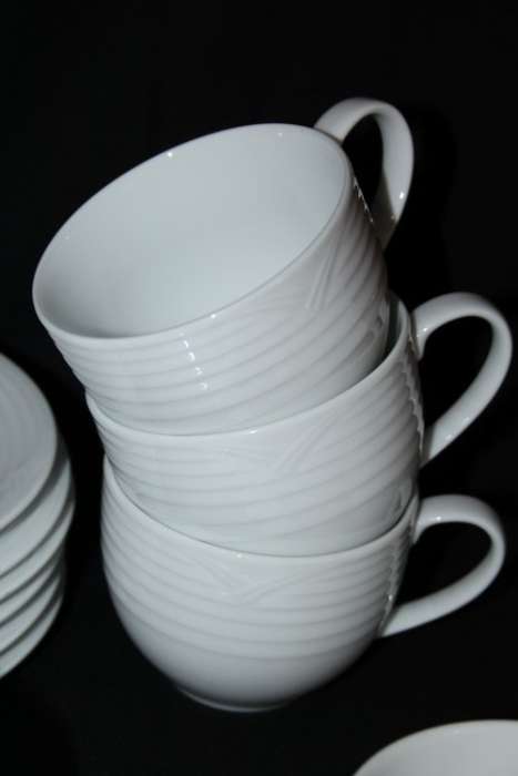 A set of Noritake "Arctic White" porcelain - 7 cups and 8 saucers in amazing condition