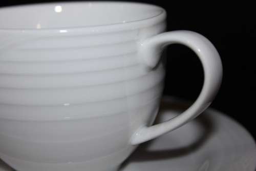 A set of Noritake "Arctic White" porcelain - 7 cups and 8 saucers in amazing condition