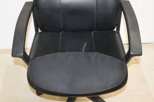 A comfortable faux-leather swivel office/ desk chair - would be ideal for home study