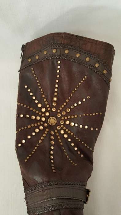 A beautiful and very sexy pair of brown ladies 1to3 mid-calf "studded" stiletto heel zip-up boots