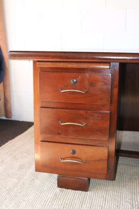 An awesome "curved front" office/ executive desk with ample drawers in great condition