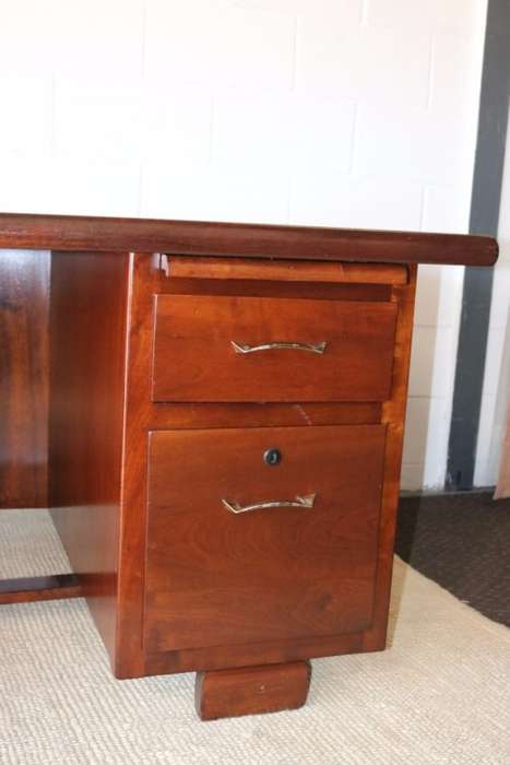 An awesome "curved front" office/ executive desk with ample drawers in great condition