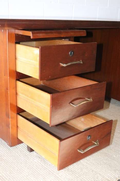 An awesome "curved front" office/ executive desk with ample drawers in great condition